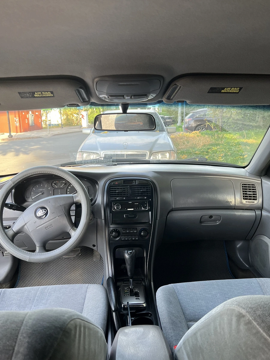 Kia Optima, 2004г., передний привод, автомат