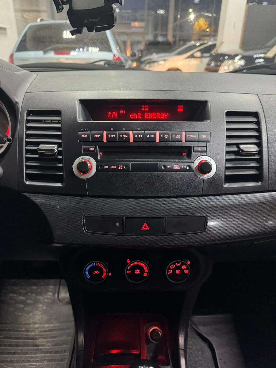 Mitsubishi Lancer, 2009г., передний привод, автомат