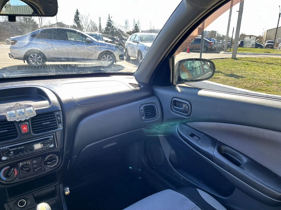 Nissan Almera, 2004г., передний привод, механика