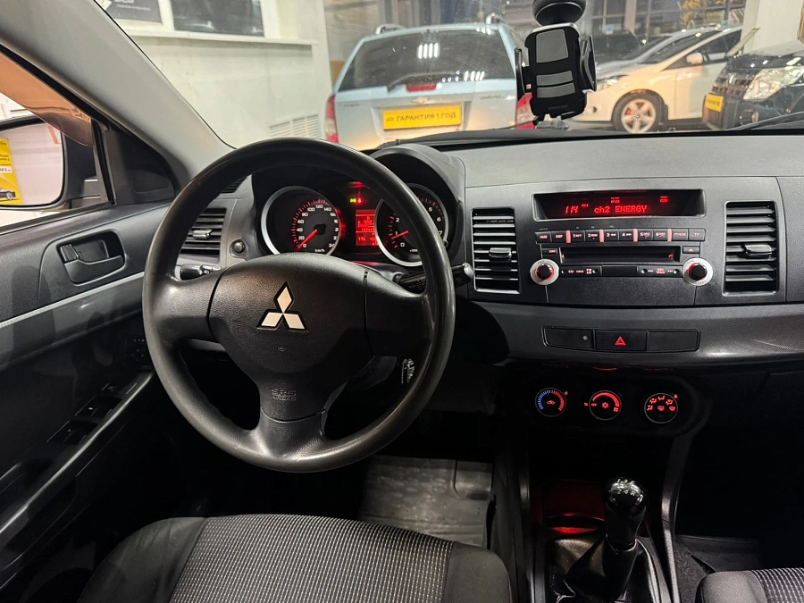 Mitsubishi Lancer, 2009г., передний привод, автомат