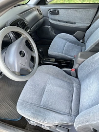 Kia Optima, 2004г, передний привод, автомат