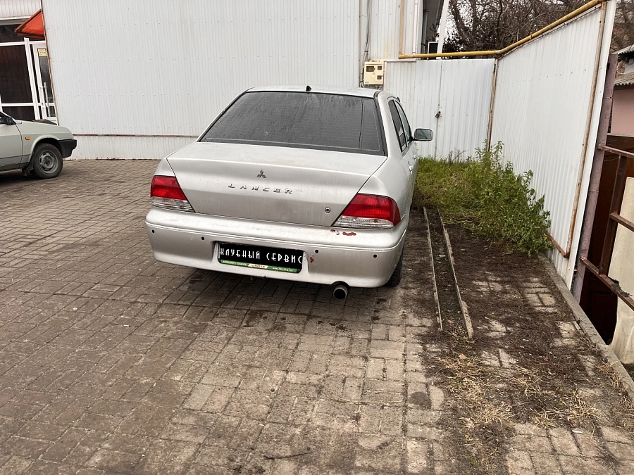 Mitsubishi Lancer, 2002г., передний привод, вариатор