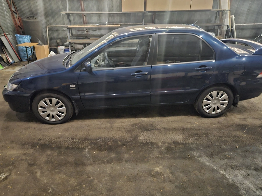 Mitsubishi Lancer, 2006г., передний привод, автомат