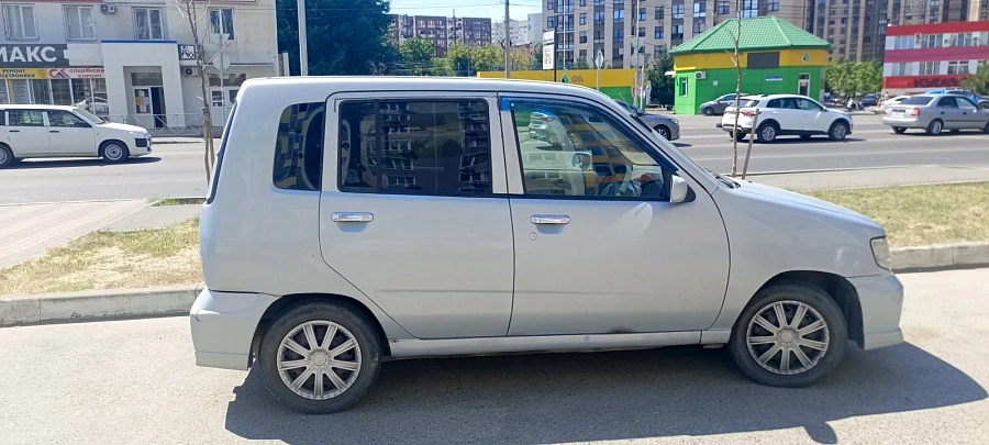 Nissan Cube, 2001г., передний привод, автомат