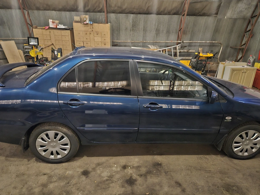Mitsubishi Lancer, 2006г., передний привод, автомат