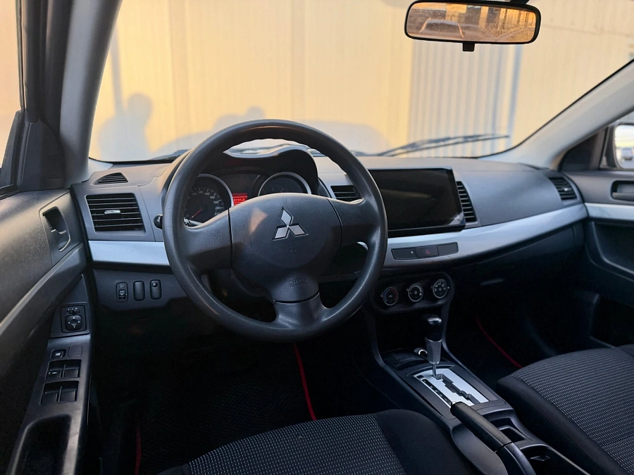 Mitsubishi Lancer, 2010г., передний привод, автомат