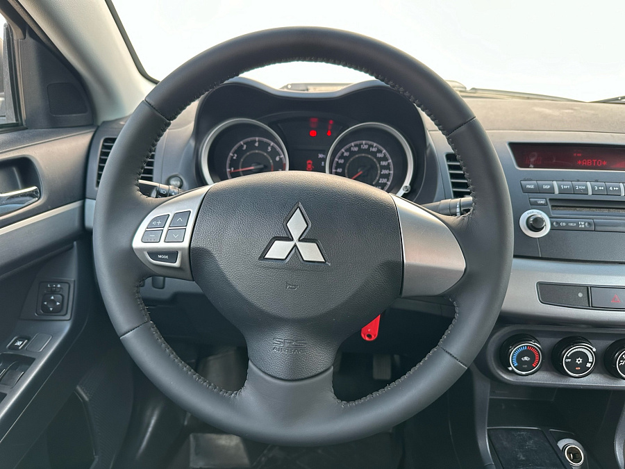 Mitsubishi Lancer, 2011г., передний привод, механика